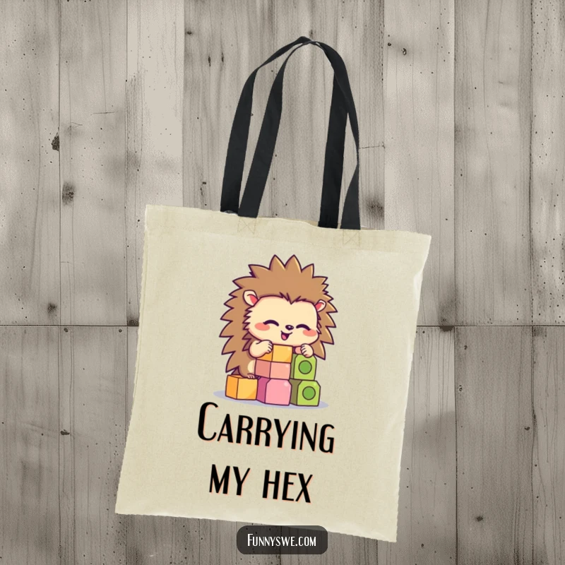 Funny hedgehog character concentrating on stacking hexagonal code blocks on a reusable tote bag.